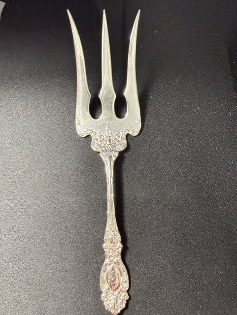 R. Wallace & Sons sterling silver cold meat fork circa 1900 with repousse scroll handle and monogram B