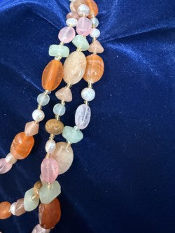 Close-up of carnelian and aquamarine beads