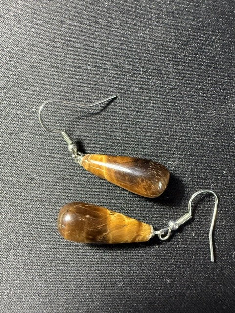 Side view of tiger eye teardrop earrings showing stone depth and fish hook closure