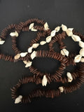Full view of 36 inch kukui seed and shell continuous loop necklace