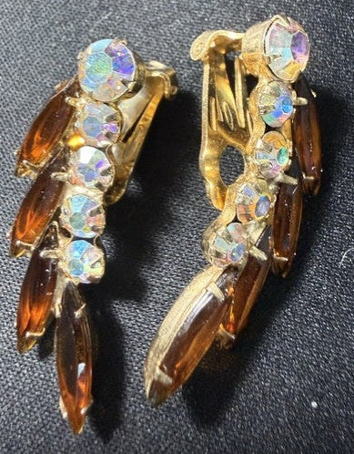Vintage gold-tone amber and aurora borealis rhinestone clip-on earrings front view