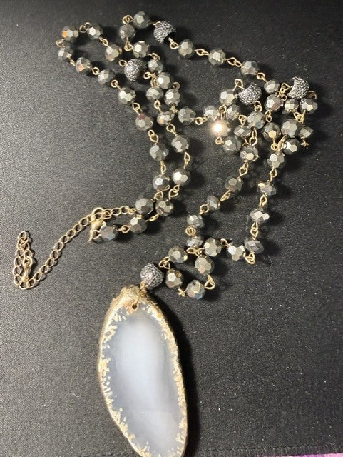 Full length view of 38 inch druzy agate necklace with hematite accent beads