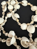 Full view of 36 inch mixed cockle and spiral shell necklace