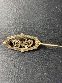 Full length view of Edwardian filigree brooch