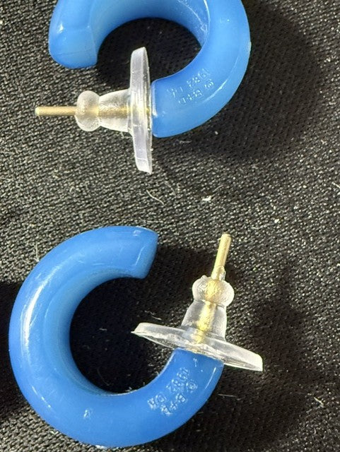Back view of vintage B+D Danish lucite hoop earrings showing post closure