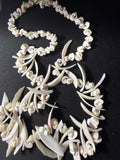 Vintage marginella shell rosette necklace full view — hand-assembled spiral shell clusters, 30 inches
