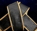 Vintage Brooks Brothers black leather gold-tone ribbon bow brooch front view