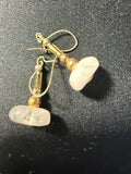 Handmade rose quartz chip dangle earrings with gold-tone bead spacers on kidney wire hooks