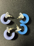 Two pairs of vintage B+D Danish lucite hoop earrings in periwinkle and sky blue