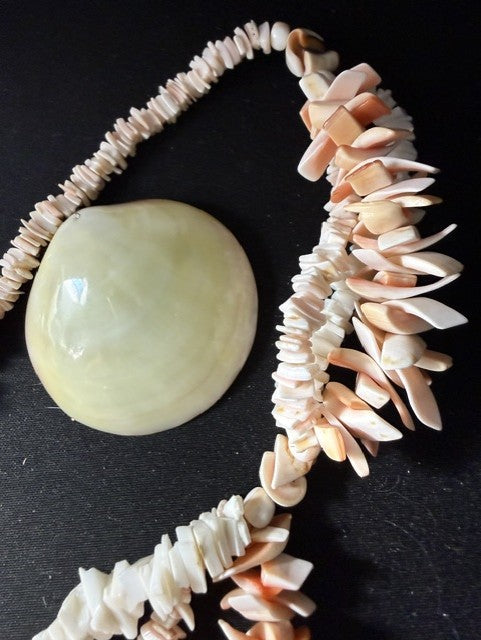 Full necklace with ruler showing 3-inch centerpiece shell and matching earrings