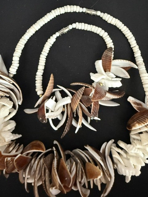 Full view of shell cluster necklace and matching bracelet set