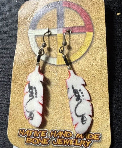 Second pair front view – bone feather earrings on display card