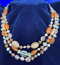 Vintage 3-strand gemstone necklace hero shot on navy velvet — carnelian, rose quartz, aquamarine, burlwood and pink freshwater pearls, 18"