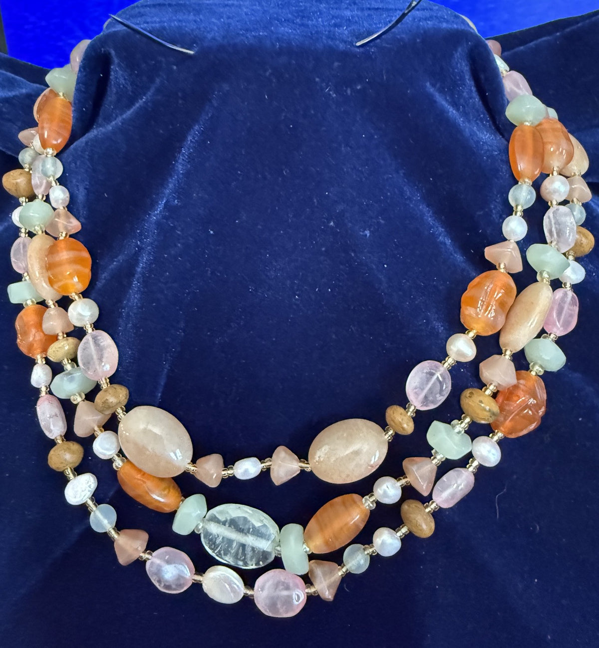 Vintage 3-strand gemstone necklace hero shot on navy velvet — carnelian, rose quartz, aquamarine, burlwood and pink freshwater pearls, 18"