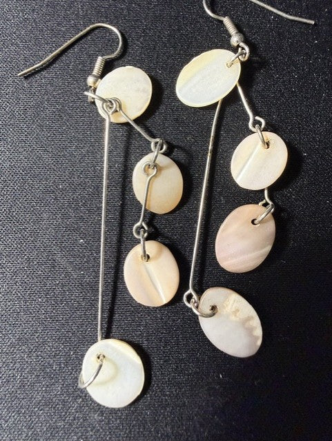 Pink mother of pearl shell dangle earrings showing cascade detail