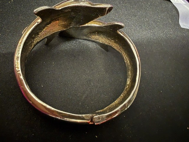 Sculptural dolphin bangle bracelet - interior hallmarks