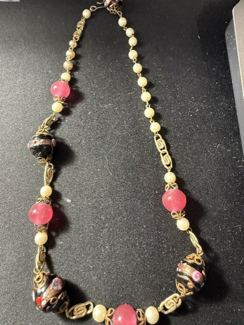 Vintage Venetian wedding cake lampwork bead necklace laid flat showing full length