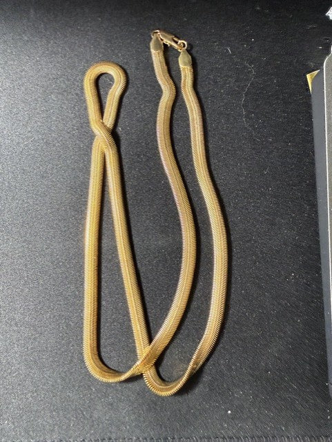 Vintage herringbone necklace showing length and drape