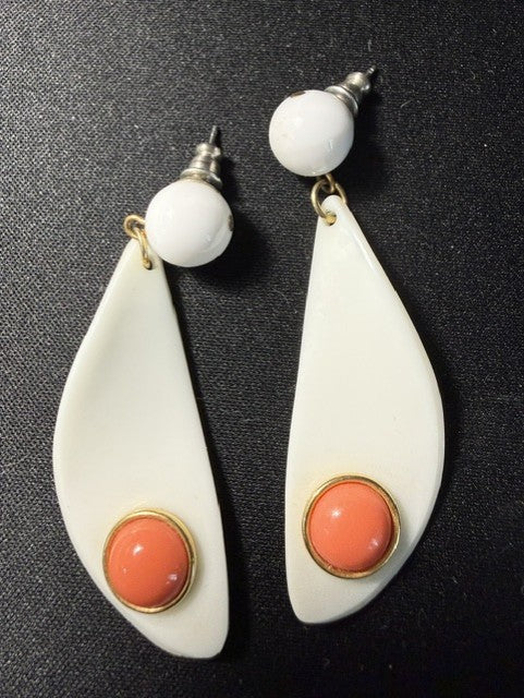Signed Avon mod white teardrop dangle earrings with coral cabochon and gold-tone bezel