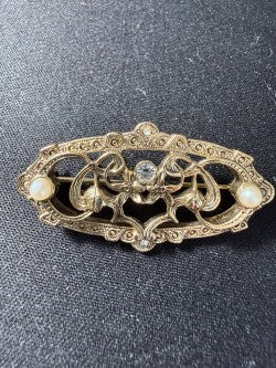 Edwardian gold-tone filigree brooch with seed pearls and rhinestones, front view