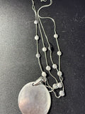 Vintage silver-tone multi-strand disc station necklace with round pendant