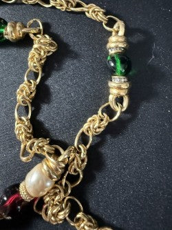 Chain link and emerald green bead detail
