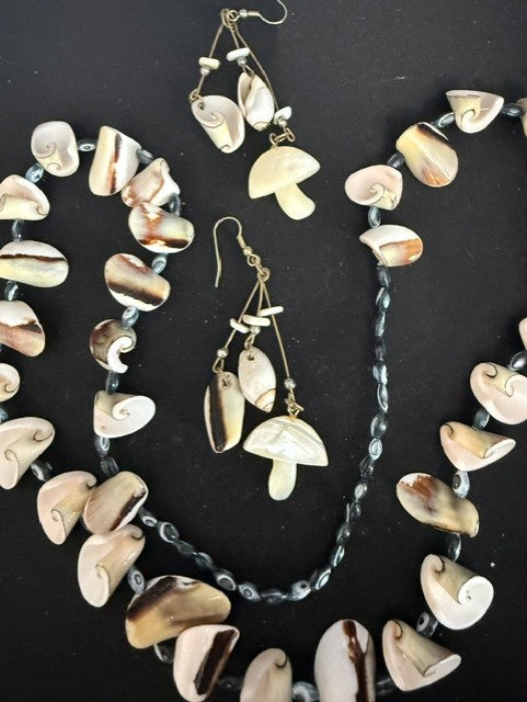 Full view of black lip shell necklace with Mother of Pearl mushroom earrings set