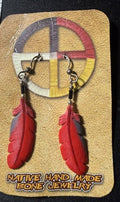Front view – red cardinal feather earrings on display card