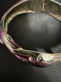 Sculptural dolphin bangle bracelet - interior hinge detail