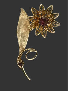 Vintage Van Dell filigree flower brooch shown against ruler for scale