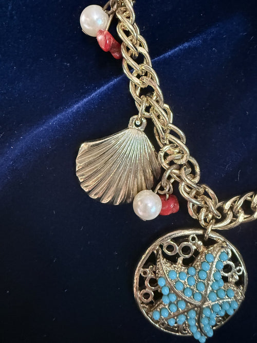 Bella Del Mar Gold-Tone Coastal Charm Necklace — Turquoise Starfish Pendant, Pearl & Coral Beads