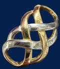 Vintage two-tone Celtic knot brooch with ruler showing approximately 1.5-2 inch size