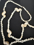 Full view of 30 inch turritella and cowrie shell continuous loop necklace